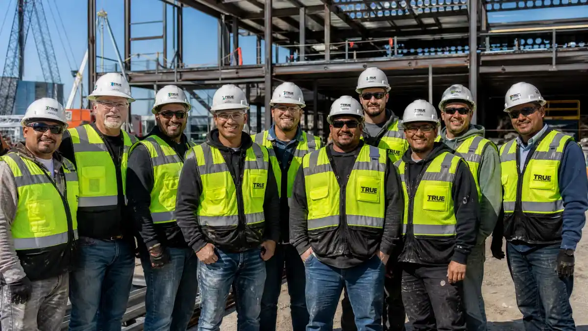 Home Summit Construction Group ANSI/CSA compliant hi-vis safety vests and branded work jackets - 500 units with hard hat decals